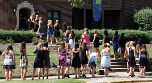 Students go from house to house during rush to determine which sororities they want to place a bid for. 