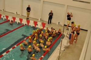 The swim team gets pumped up before competing against Convent of the Sacred Heart,